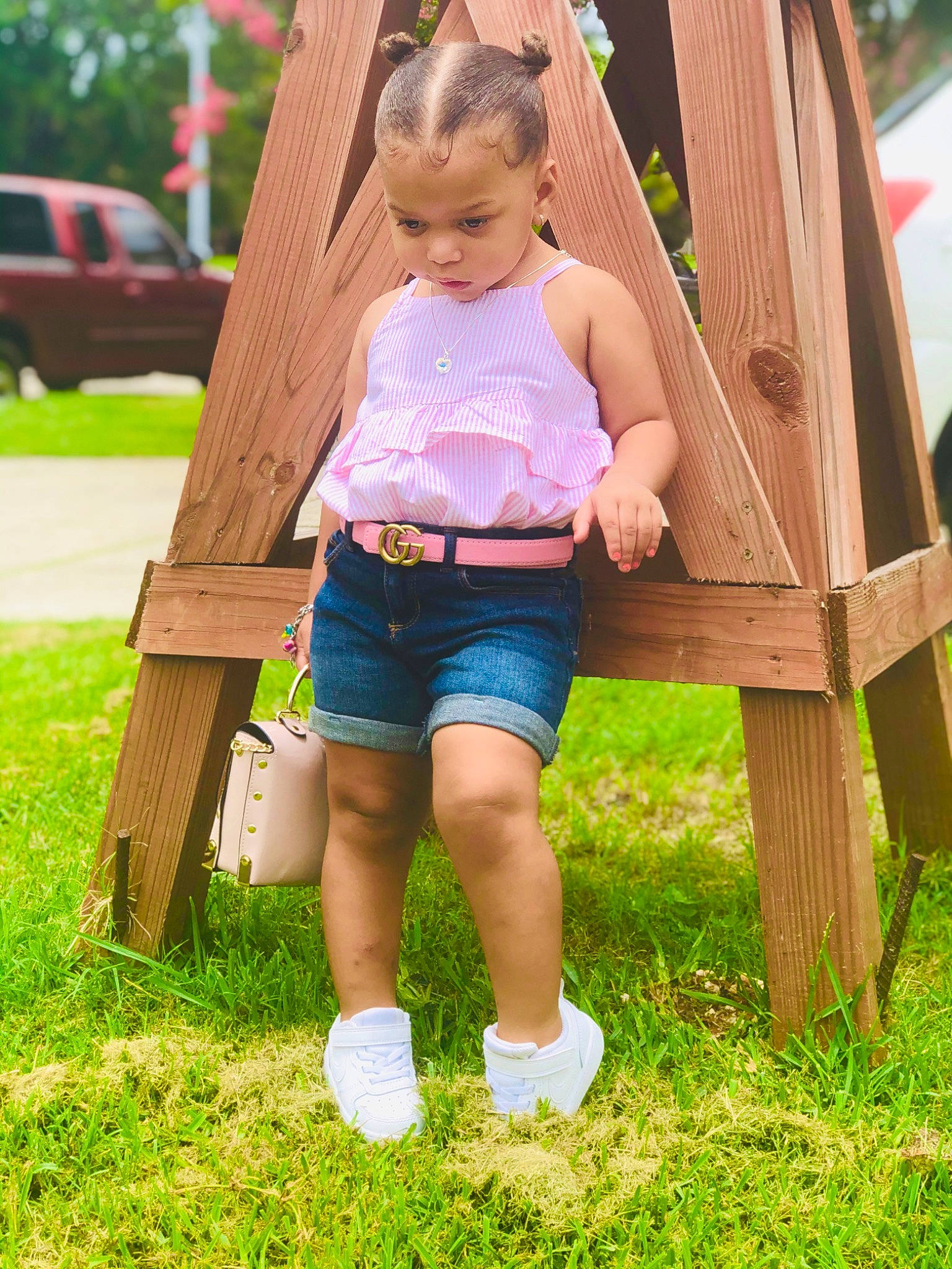 Camari is registered to the contest to win money with this photo: child, child_model, fun, grass, leisure, person, plant, play, playground, public_space, summer, swing, toddler, vacation