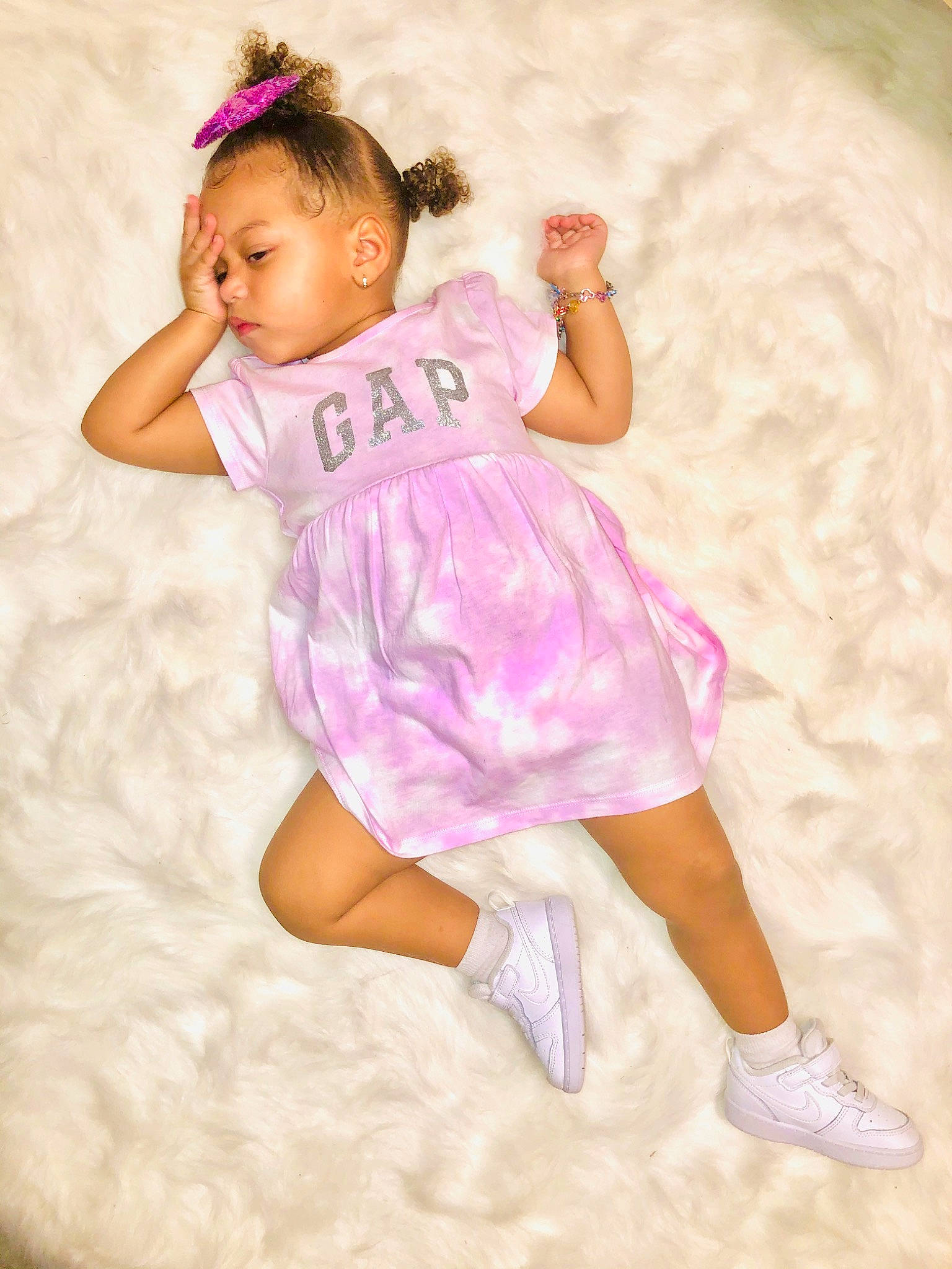 Camari is registered to the contest to win money with this photo: baby, baby_toddler_clothing, child, child_model, costume, dress, fun, happy, person, photo_shoot, photography, pink, play, purple, smile, toddler, white