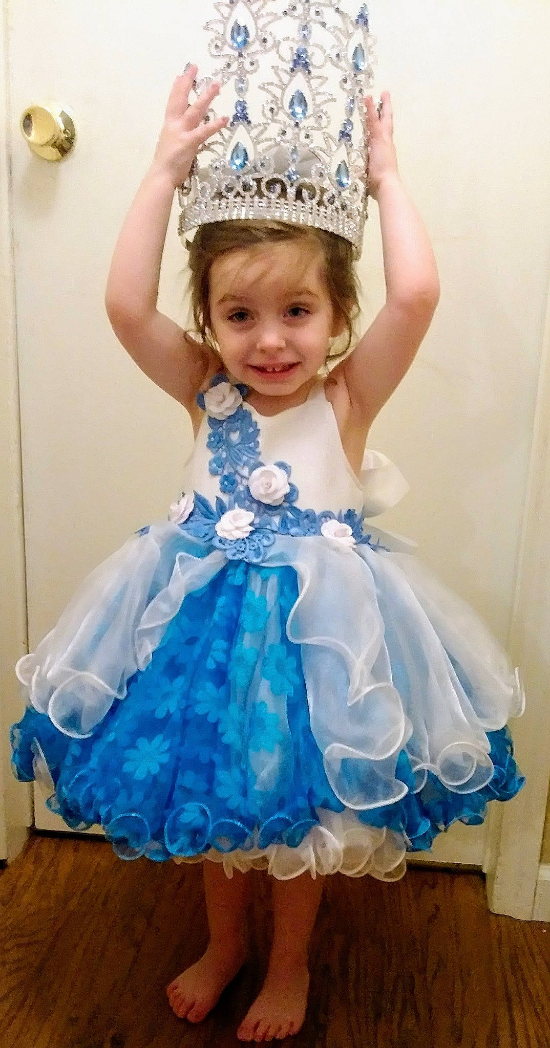 Isabella joined the competition — help win amazing prizes! aqua, blue, child, child_model, clothing, costume, costume_accessory, dress, fashion_accessory, hair_accessory, headgear, headpiece, joy, person, ruffle, toddler