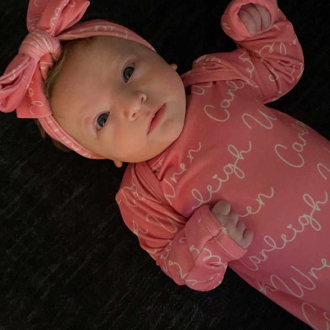 Carleigh joined the competition — help win amazing prizes! baby, bonnet, cap, clothing, coat, crawling, dress, face, formalwear, happy, hat, head, hood, newborn, person, photography, portrait, sleeve, smile, t_shirt