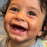 Shayel participe au concours pour gagner de l'argent avec cette photo : toddler, child, smiling, face, teeth, eyes, hair, indoor, portrait, happy, cute, baby, skin, clothing, expression, person, head, closeup, young, casual