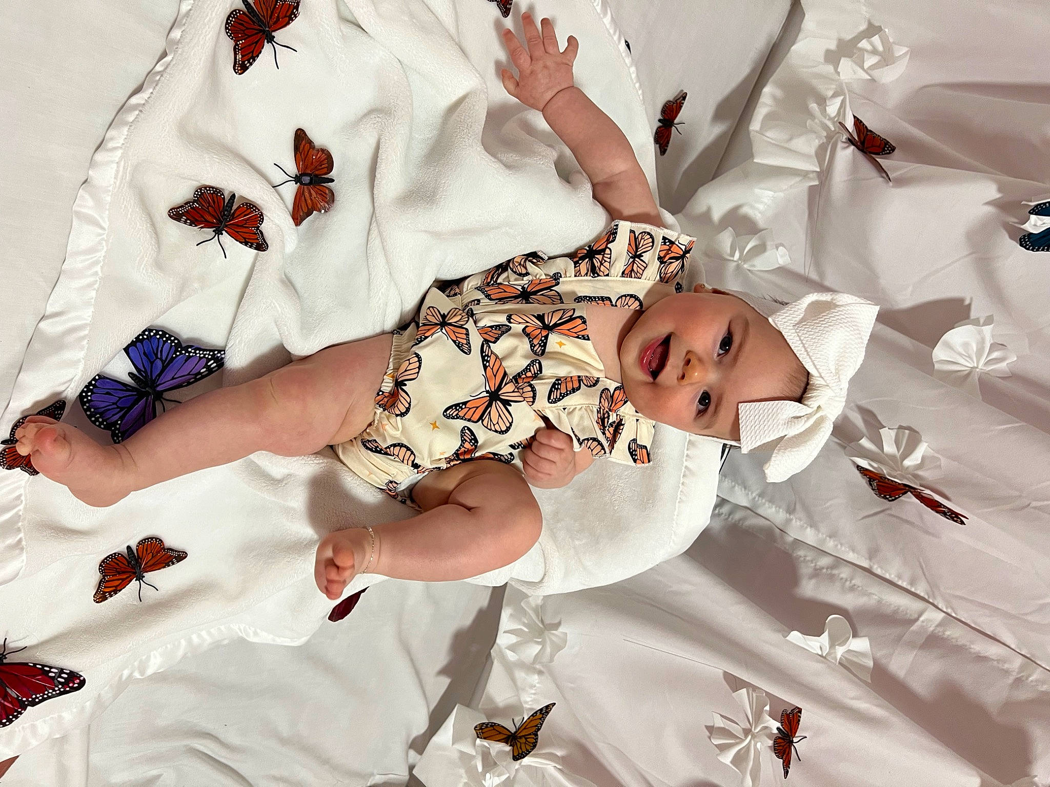 Leah joined the competition — help win amazing prizes! arm, baby, baby_products, baby_sleeping, baby_toddler_clothing, carmine, child, comfort, event, finger, gesture, happy, headwear, joy, linens, pattern, person, room, sleeve, t_shirt