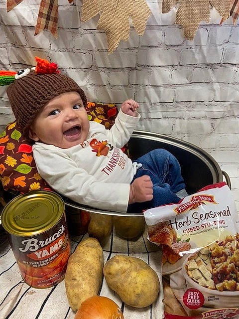 Elliott is registered to the contest to win money with this photo: baby, bread, bread_roll, bun, child, comfort_food, cuisine, delicacy, dish, food, gluten, graham_bread, happy, headwear, ingredient, junk_food, local_food, natural_foods, person, produce