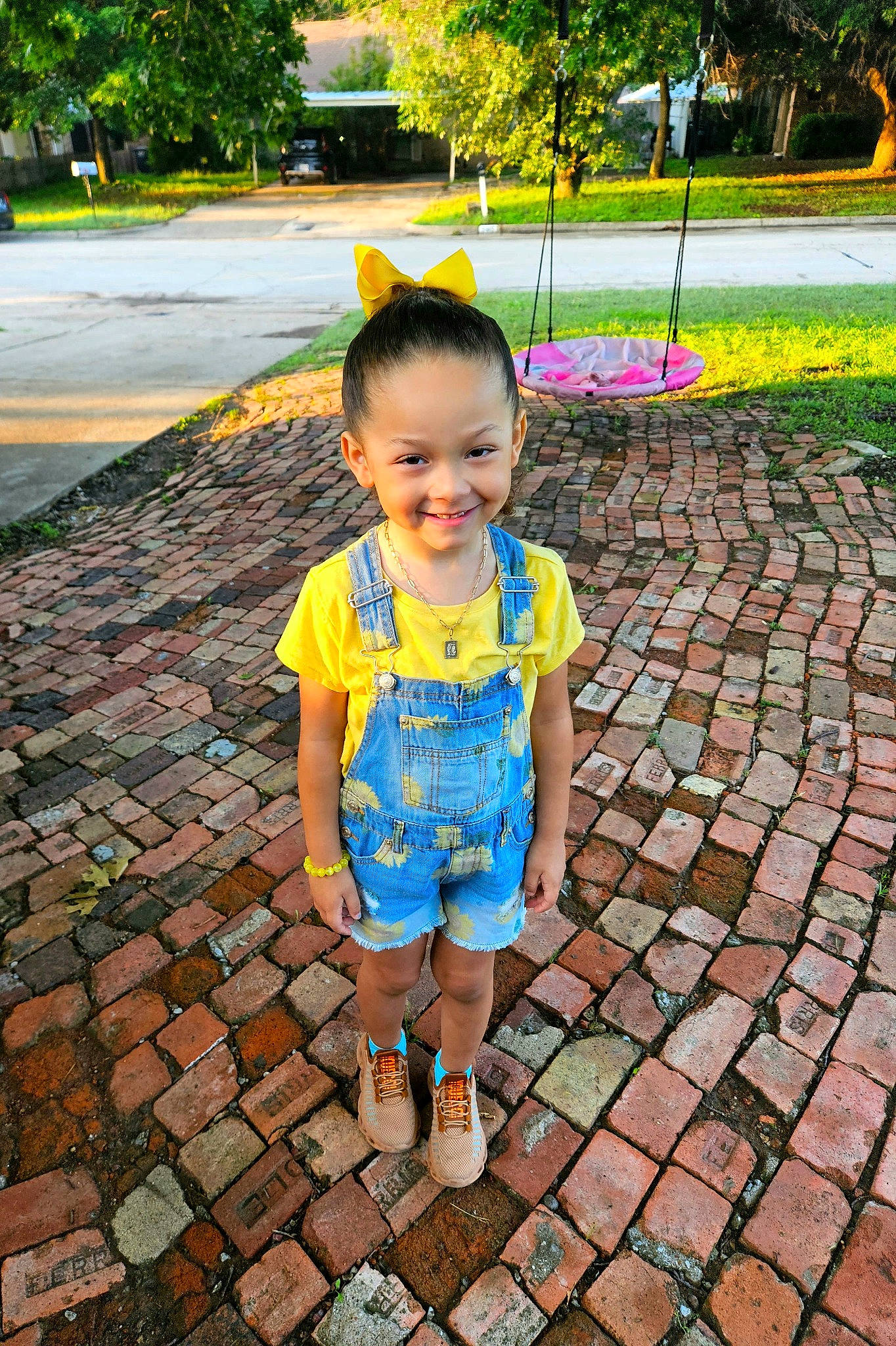 Khaleesia is registered to the contest to win money with this photo: baby_toddler_clothing, child, city, fun, grass, green, happy, human_settlement, joy, leisure, person, plant, recreation, road_surface, shorts, sidewalk, smile, snapshot, summer, toddler