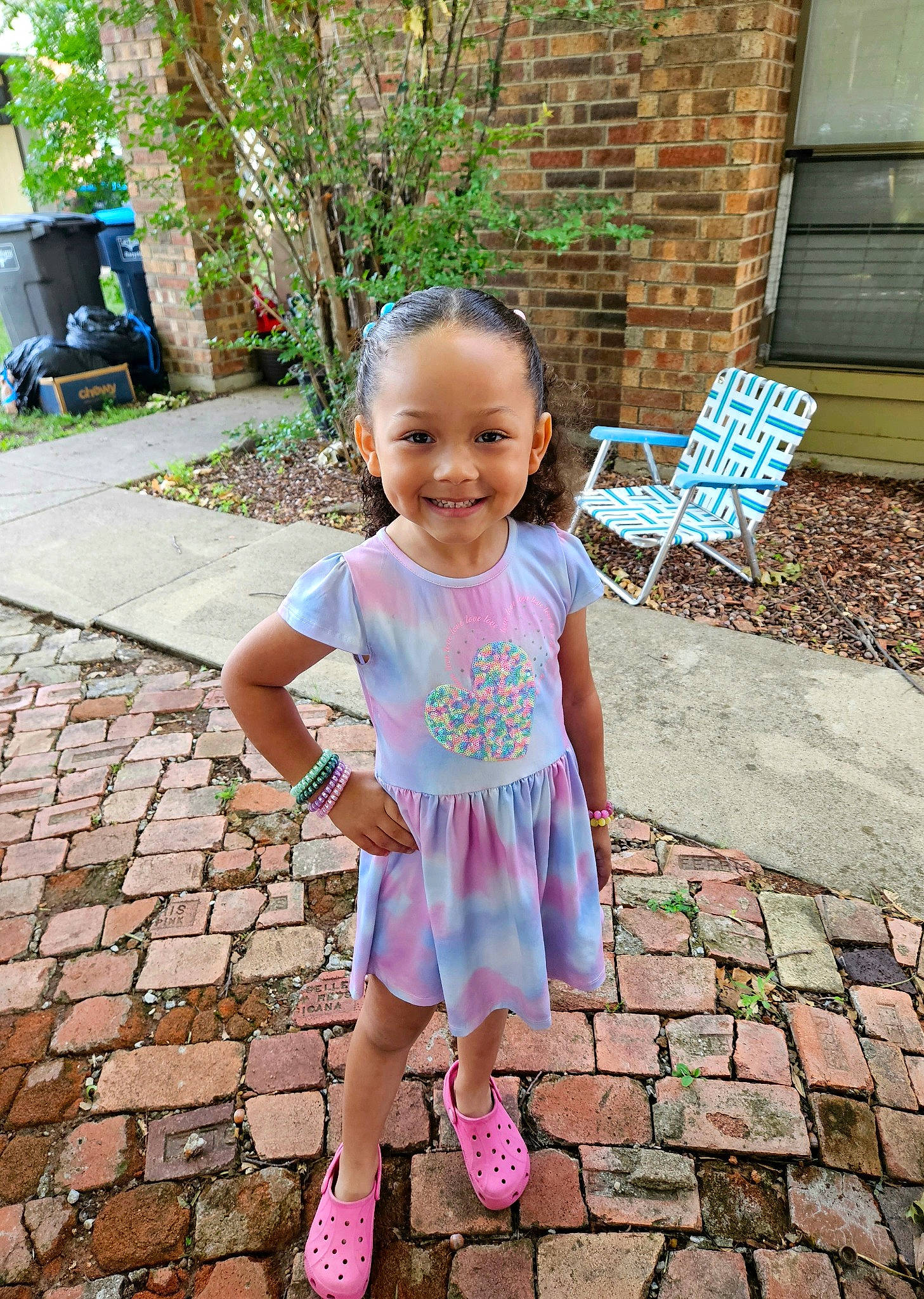 Khaleesia is registered to the contest to win money with this photo: baby_toddler_clothing, child, fun, grass, green, happy, joy, leisure, magenta, morning, people, person, photograph, pink, plant, sandal, sidewalk, smile, snapshot, summer