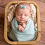 baby, basket, blanket, crib, face, furniture, hardwood, head, infantbed, newborn, person, photography, portrait, sleeping, wood