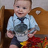Liam joined the competition — help win amazing prizes! toddler, child, watering_can, wooden_bench, heart_cutout, blue_shirt, tie, shorts, autumn_leaves, flowers, smile, indoor, portrait, cute, baby, holding_object, decor, seasonal, happy, person