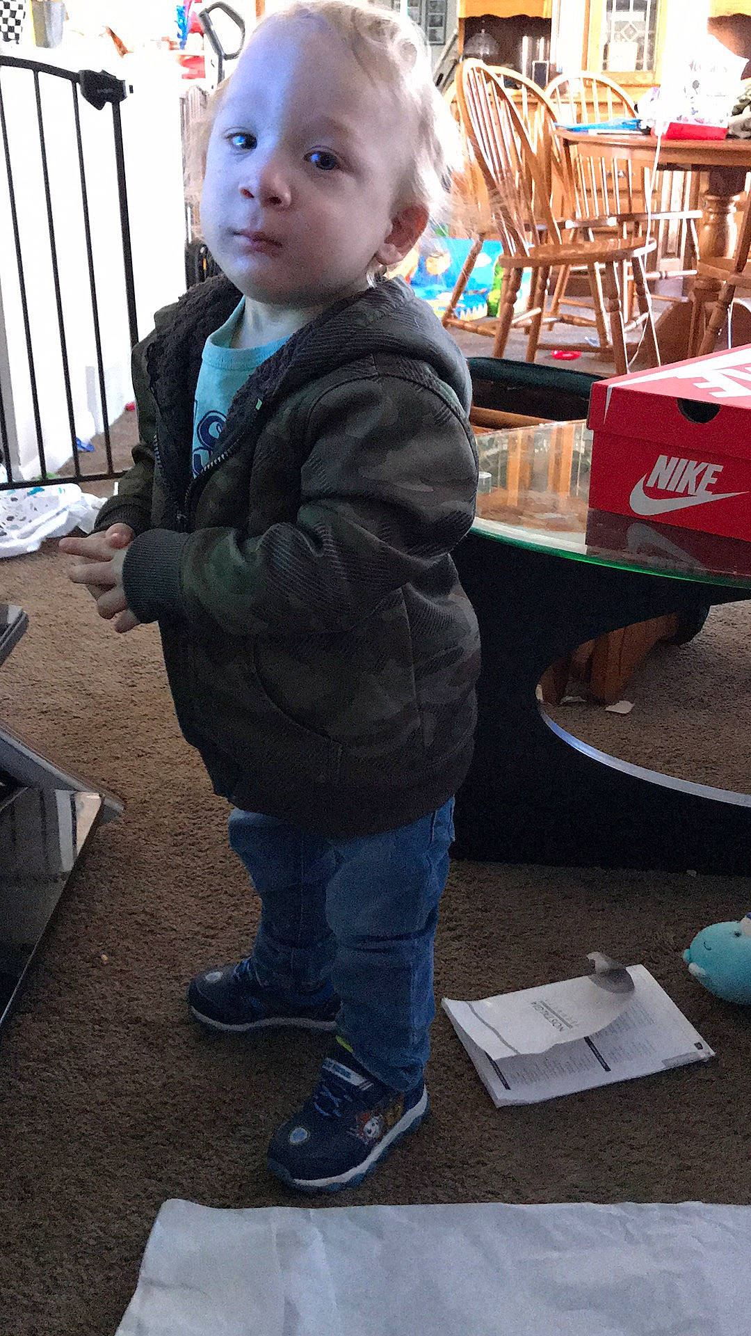 Leland is registered to the contest to win money with this photo: baby, baby_toddler_clothing, box, chair, cheek, child, denim, fun, happy, leisure, person, room, shoe, sitting, sleeve, sneakers, table, toddler, vacation, white