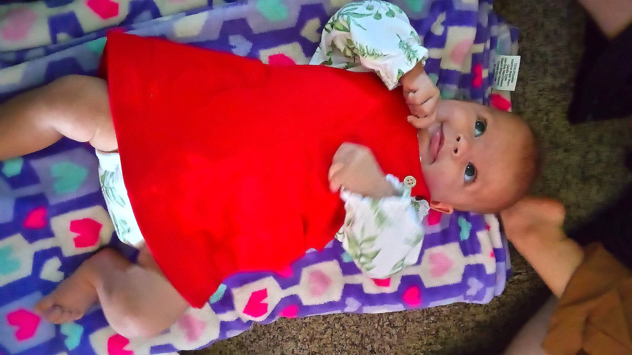 Maryjayne is registered to the contest to win money with this photo: baby, baby_products, baby_toddler_clothing, baby_toys, child, comfort, event, fun, happy, hat, lap, linens, person, pink, play, red, room, toddler, toy