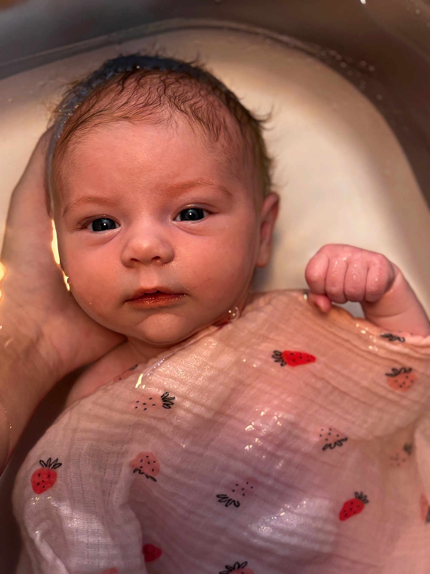 Rose participe au concours pour gagner de l'argent avec cette photo : baby, bath, child, closeup, cloth, cute, expression, eyes, face, hand, infant, newborn, pattern, portrait, skin, soft, strawberry, tender, water, wet