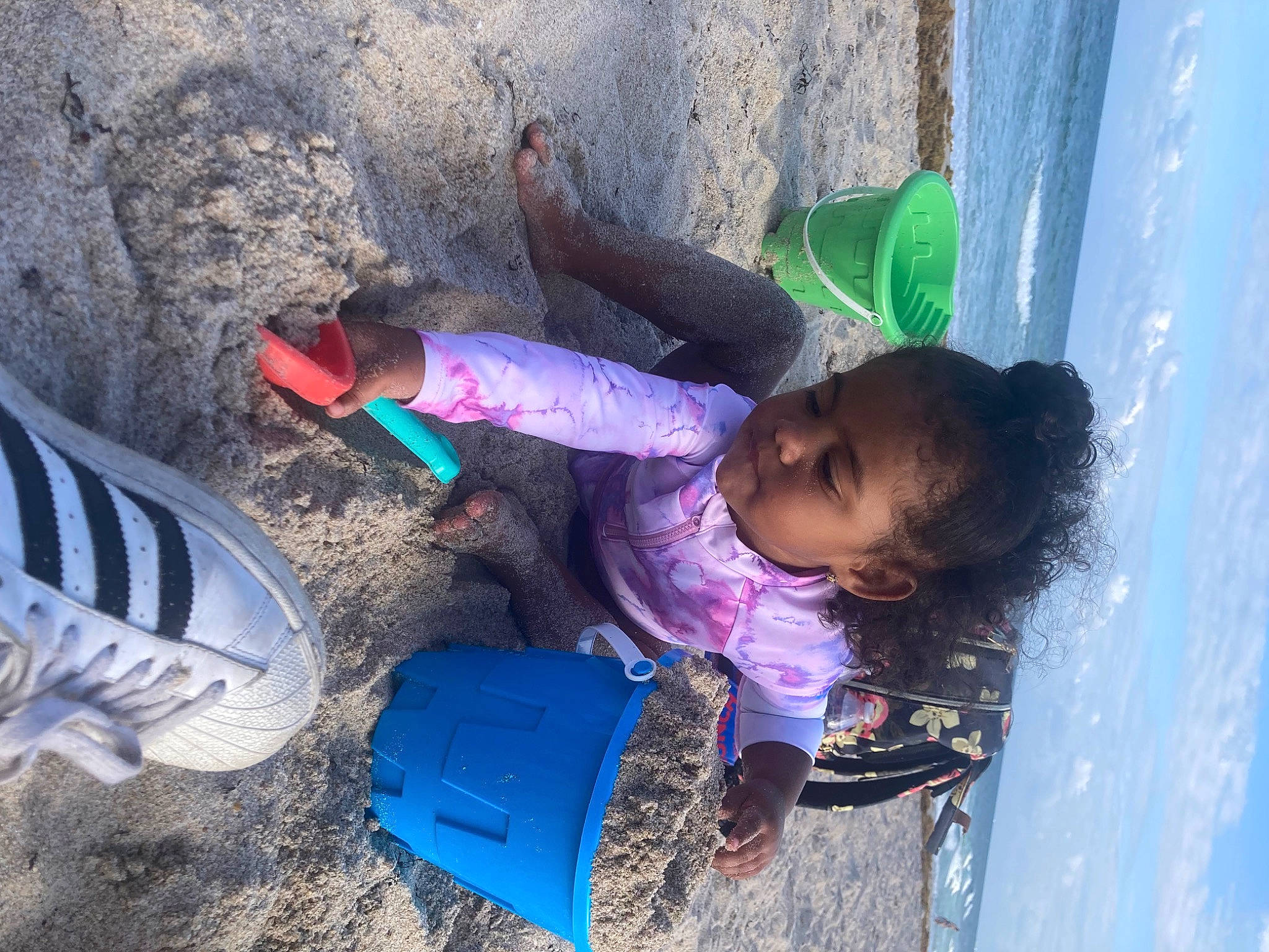 Jazlynn is registered to the contest to win money with this photo: blue, carmine, child, electric_blue, fun, leisure, magenta, people_in_nature, person, play, recreation, red, shadow, shoe, soil, toddler, water