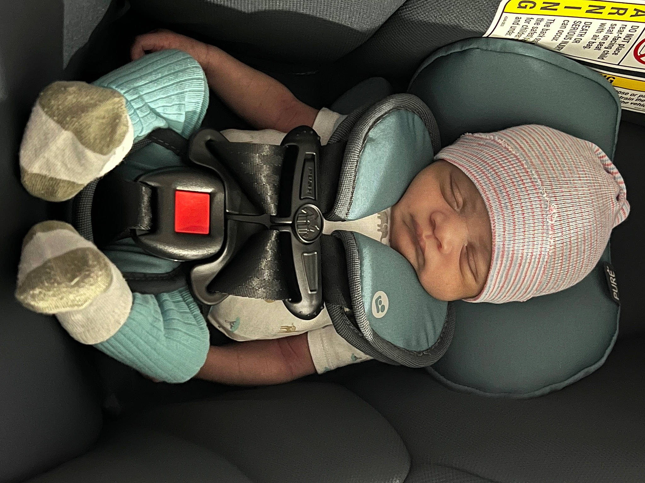Beckham joined the competition — help win amazing prizes! arm, auto_part, baby, baby_in_car_seat, baby_products, baby_sleeping, baby_toddler_clothing, car_seat, comfort, elbow, fashion_accessory, finger, hand, headgear, headwear, helmet, person, personal_protective_equipment, sitting, sunglasses