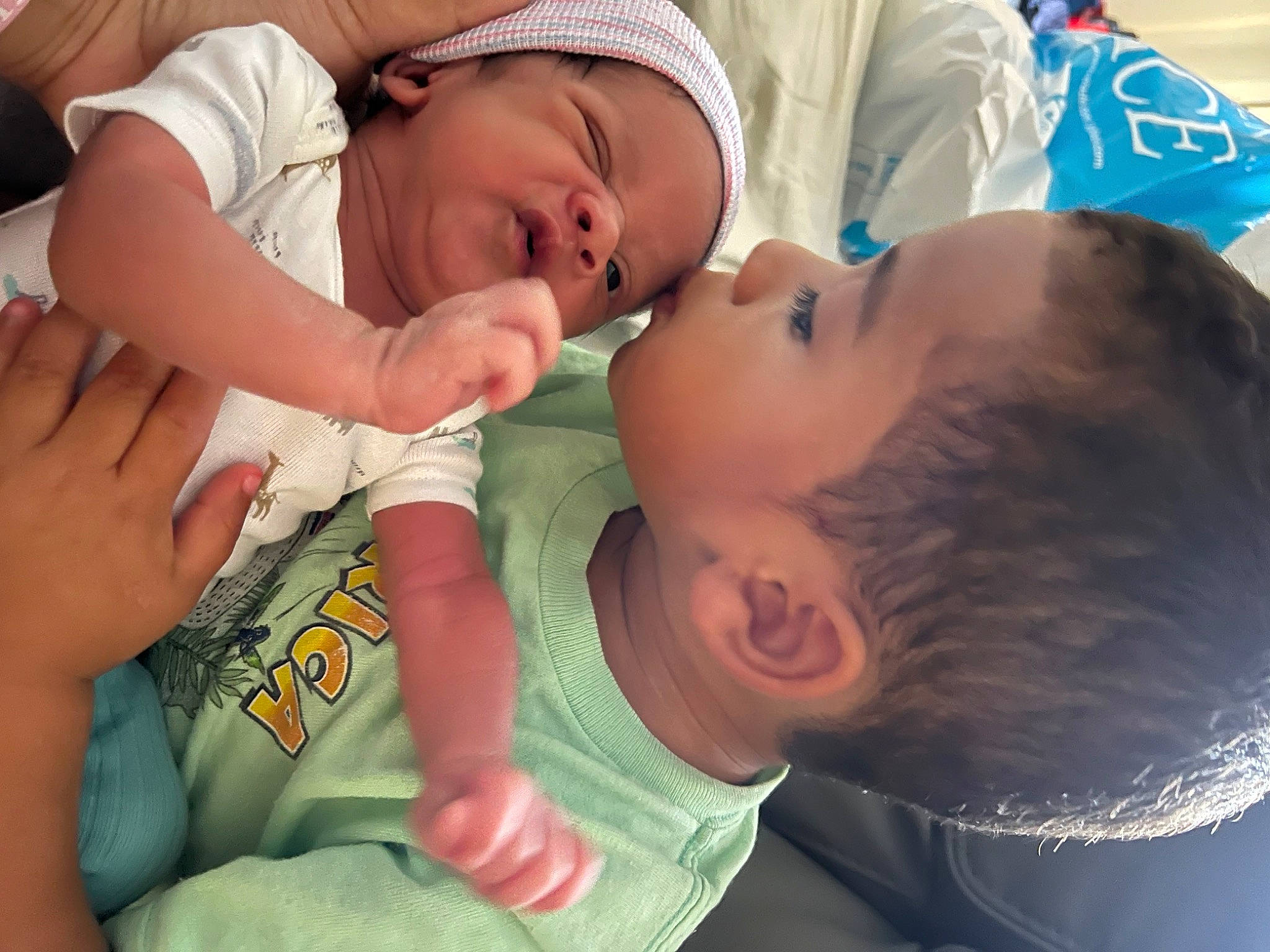 Beckham is registered to the contest to win money with this photo: baby, baby_products, baby_toddler_clothing, cheek, child, comfort, drinkware, ear, eyelash, finger, fun, gesture, happy, head, mouth, nail, nose, person, skin, thumb