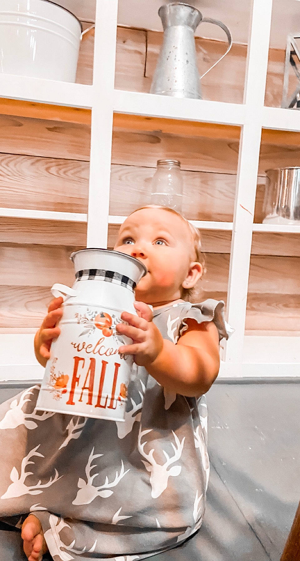 Kaelynn is registered to the contest to win money with this photo: baby, baby_products, baby_safety, baby_toddler_clothing, child, finger, font, fun, happy, logo, peach, person, portrait_photography, shorts, sleeve, t_shirt, thumb, toddler, vacation, wood