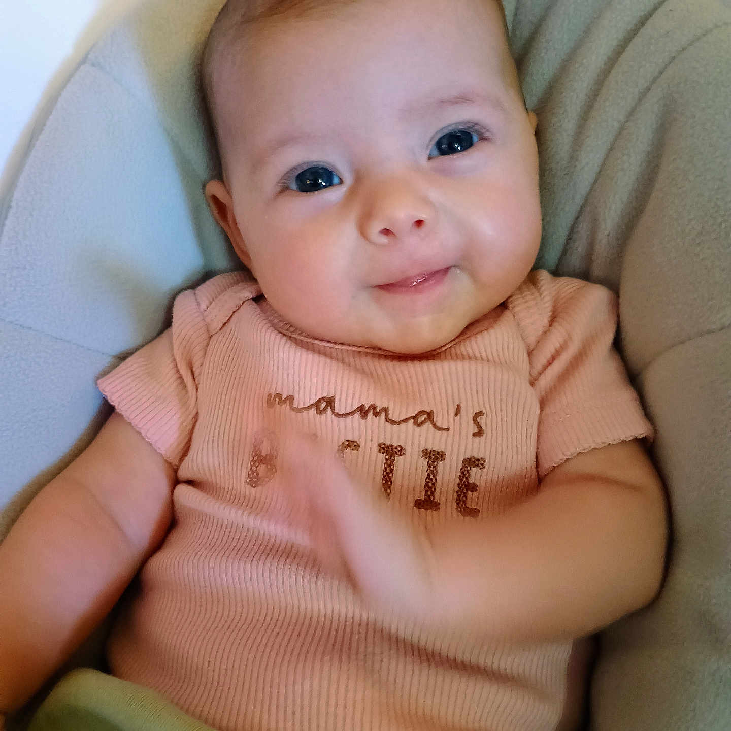 Norma is registered to the contest to win money with this photo: baby, bodypart, clothing, cushion, face, finger, furniture, hand, happy, head, homedecor, knitwear, newborn, person, photography, portrait, sitting, smile, sweater, t_shirt