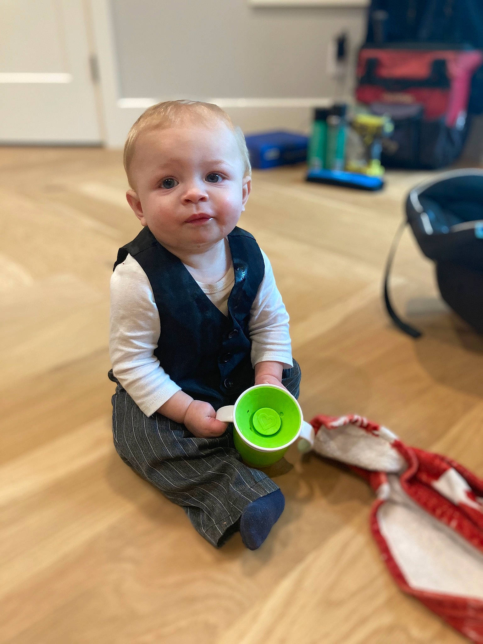 Hunter is registered to the contest to win money with this photo: baby, baby_playing_with_toys, baby_toddler_clothing, child, circle, cleanliness, flooring, fun, hardwood, person, play, room, sitting, toddler, toy, varnish, wood, wood_flooring, wrist