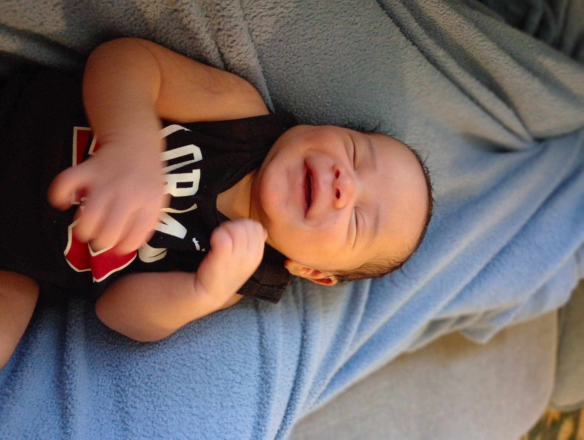 Makya is registered to the contest to win money with this photo: arm, baby, baby_sleeping, baby_toddler_clothing, cheek, child, comfort, elbow, eyelash, face, finger, nap, nose, pattern, person, sitting, skin, sleeve, t_shirt, toddler