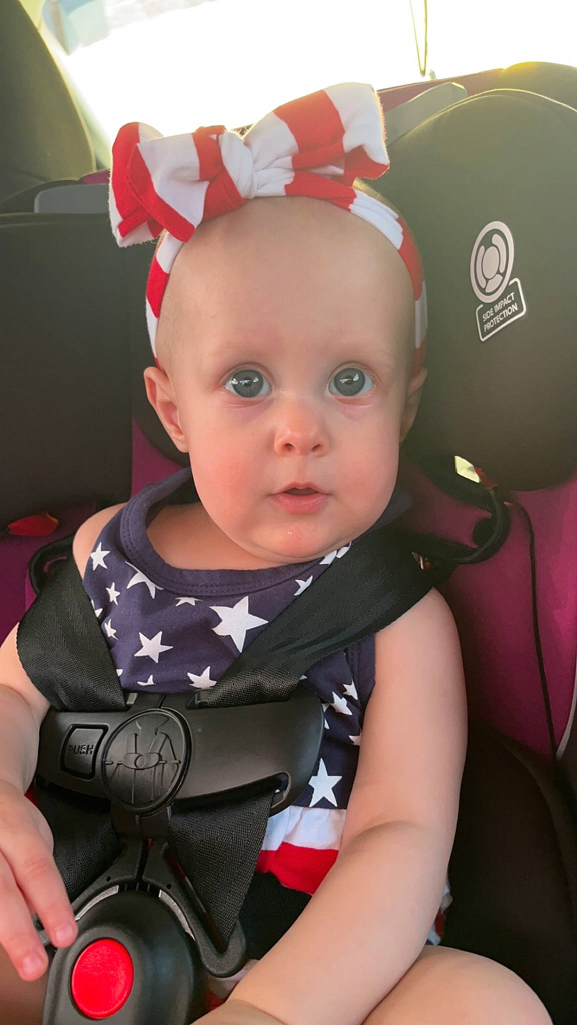 Elliana is registered to the contest to win money with this photo: arm, baby, baby_products, baby_toddler_clothing, cheek, child, cool, costume_hat, ear, eyebrow, fashion_accessory, fun, happy, human_body, iris, person, pink, sitting, skin, t_shirt