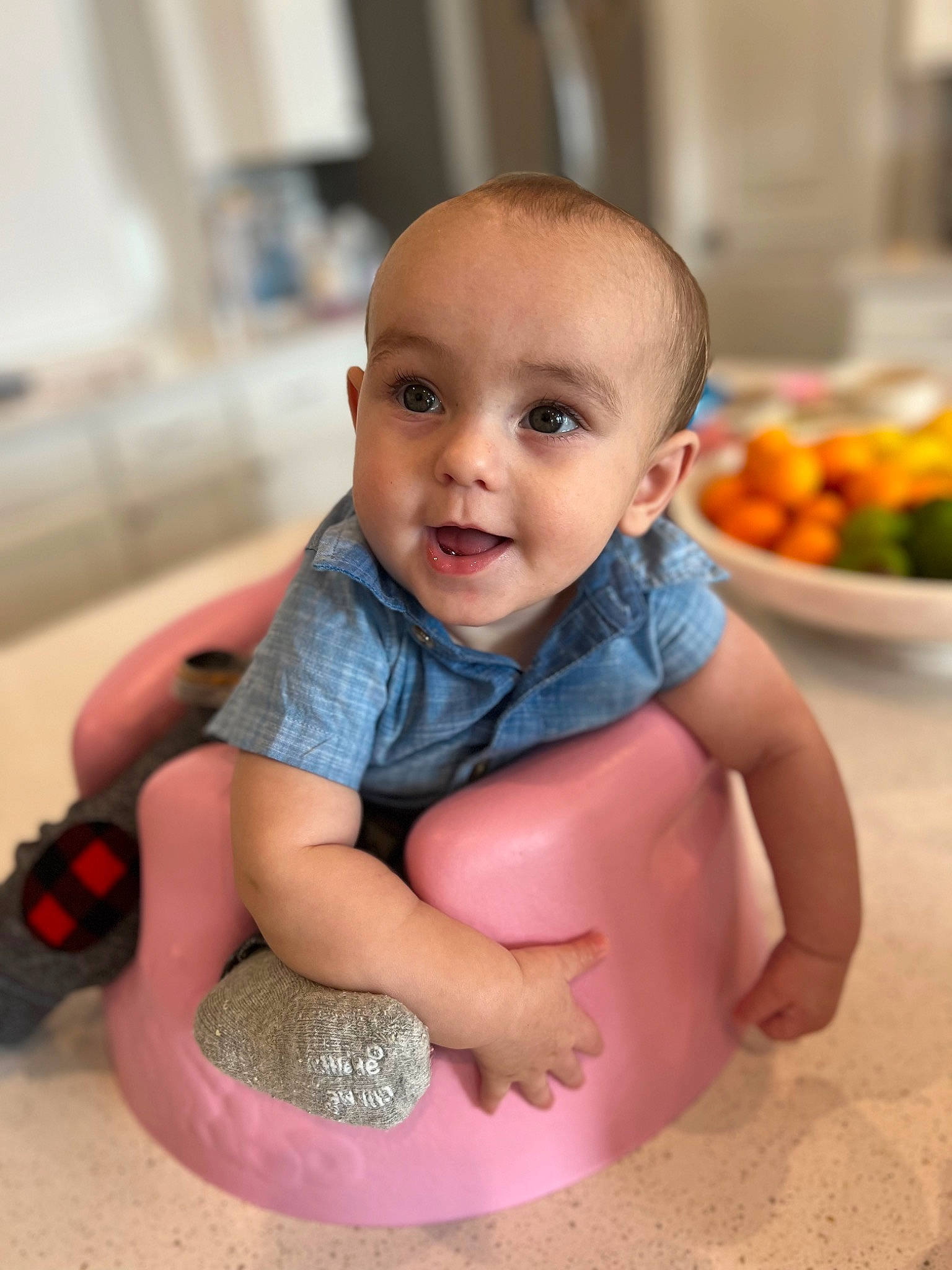 Soren is registered to the contest to win money with this photo: baby, baby_toddler_clothing, bathing, cheek, child, crawling, eye, finger, flooring, foot, fruit, fun, hairstyle, happy, joy, mouth, natural_foods, person, skin, sleeve