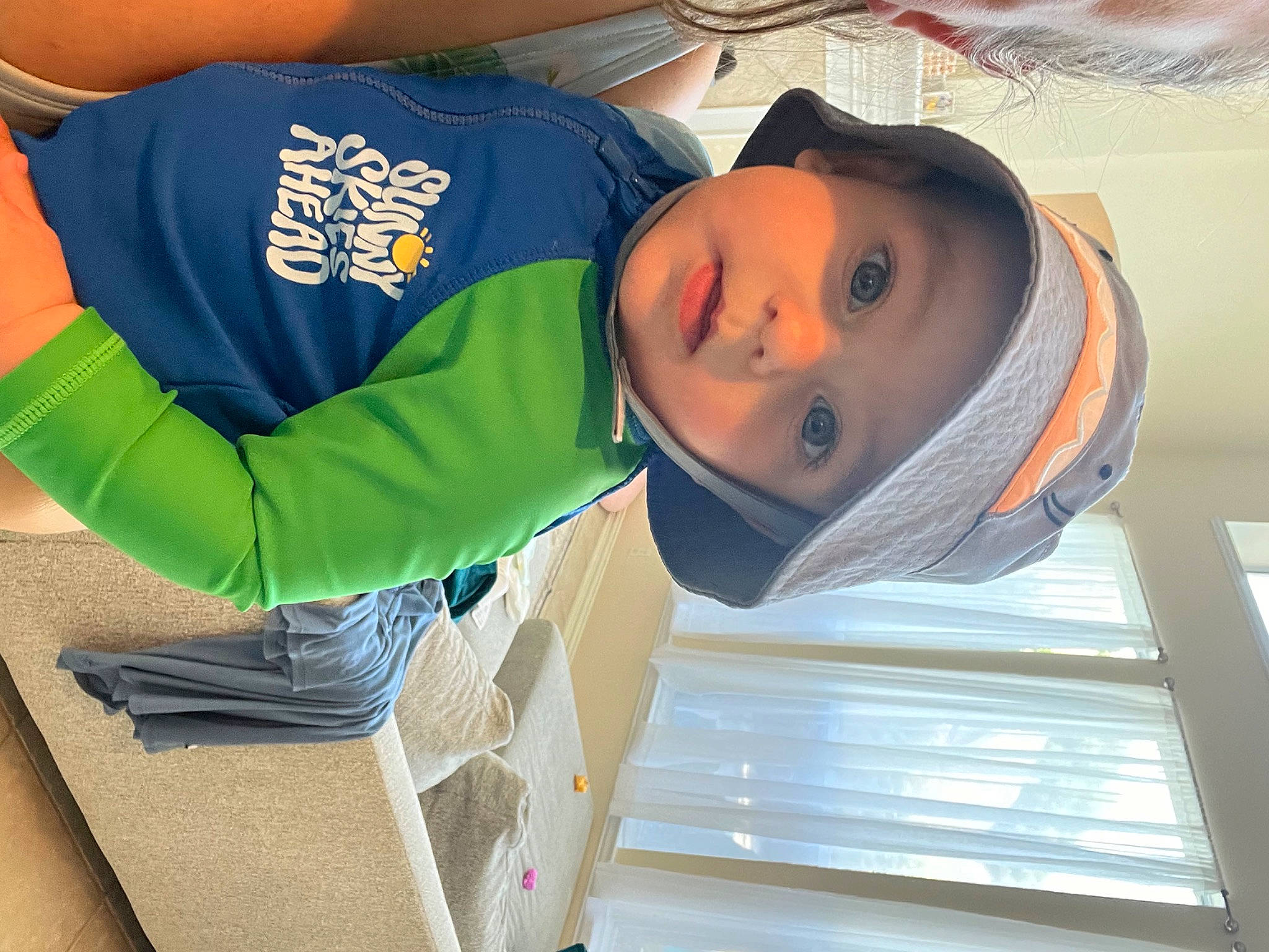 Soren joined the competition — help win amazing prizes! child, comfort, elbow, electric_blue, fun, hat, headwear, person, room, shipping_box, sleeve, t_shirt, window