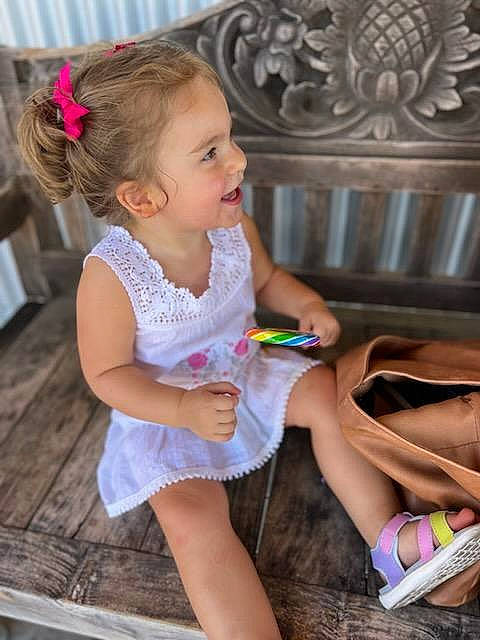 Fiona is registered to the contest to win money with this photo: baby_toddler_clothing, fun, hair, happy, head, human_body, human_leg, iris, knee, leg, leisure, organ, person, photograph, pink, skin, smile, snapshot, summer, thigh