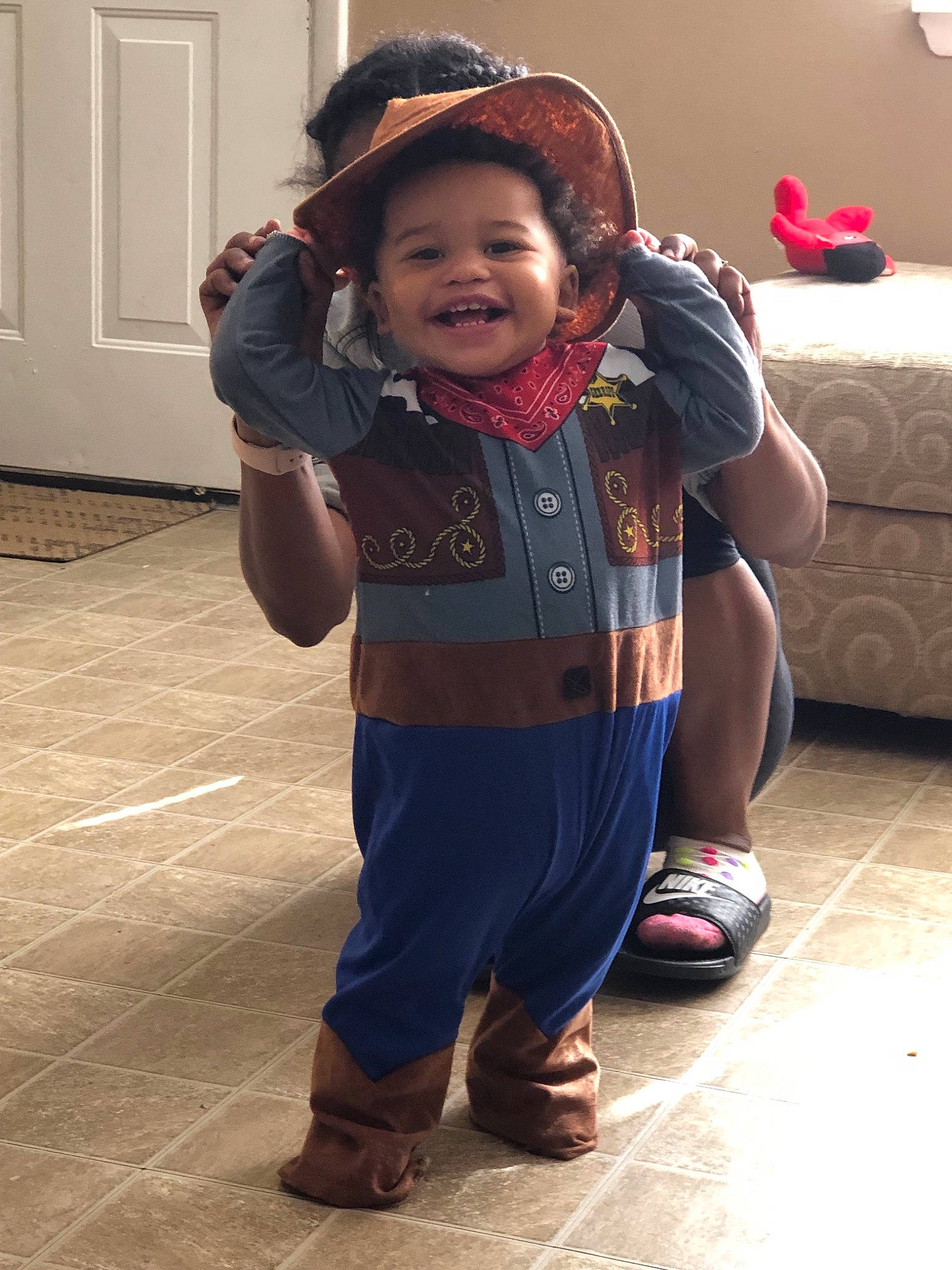 Desmond White Jr. is registered to the contest to win money with this photo: child, cool, day, fashion_accessory, fun, girl, headgear, jeans, outerwear, person, product, skin, smile, standing, textile, toddler