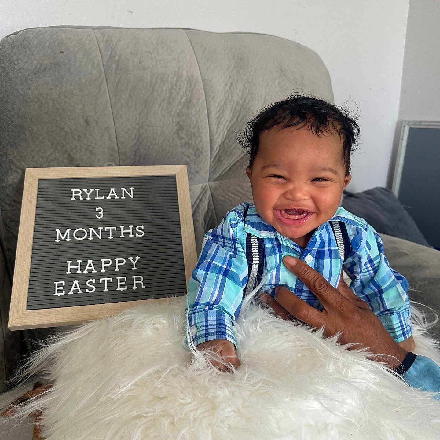 Rylan joined the competition — help win amazing prizes! baby, blackboard, bodypart, computerhardware, couch, cushion, electronics, face, finger, furniture, hand, happy, head, homedecor, person, photography, portrait, sitting, smile, text