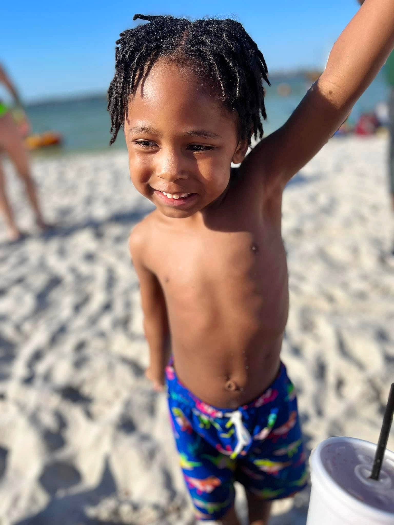 Jaylen joined the competition — help win amazing prizes! barechested, beach, board_short, chest, child, fun, hairstyle, happy, joy, leisure, people_in_nature, people_on_beach, person, photograph, sand, sky, smile, swimwear, toddler, travel