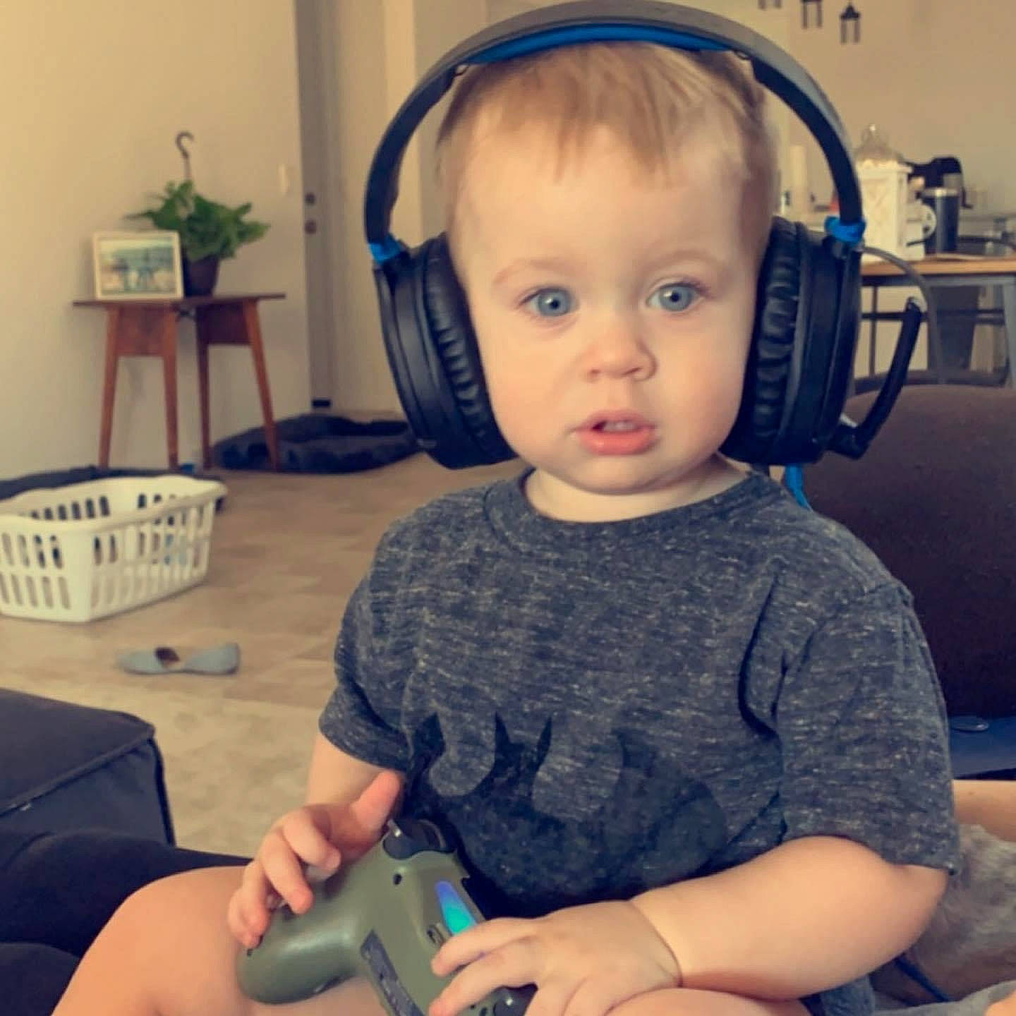 Zane joined the competition — help win amazing prizes! arm, audio_equipment, baby, chair, child, ear, electronic_device, gadget, head, headphones, hearing, person, play, technology, toddler