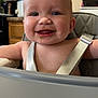 baby, high_chair, smiling, face, food, messy, kitchen, cabinet, straps, child, happy, indoor, person, seat, cute, infant, expression, feeding, domestic, young