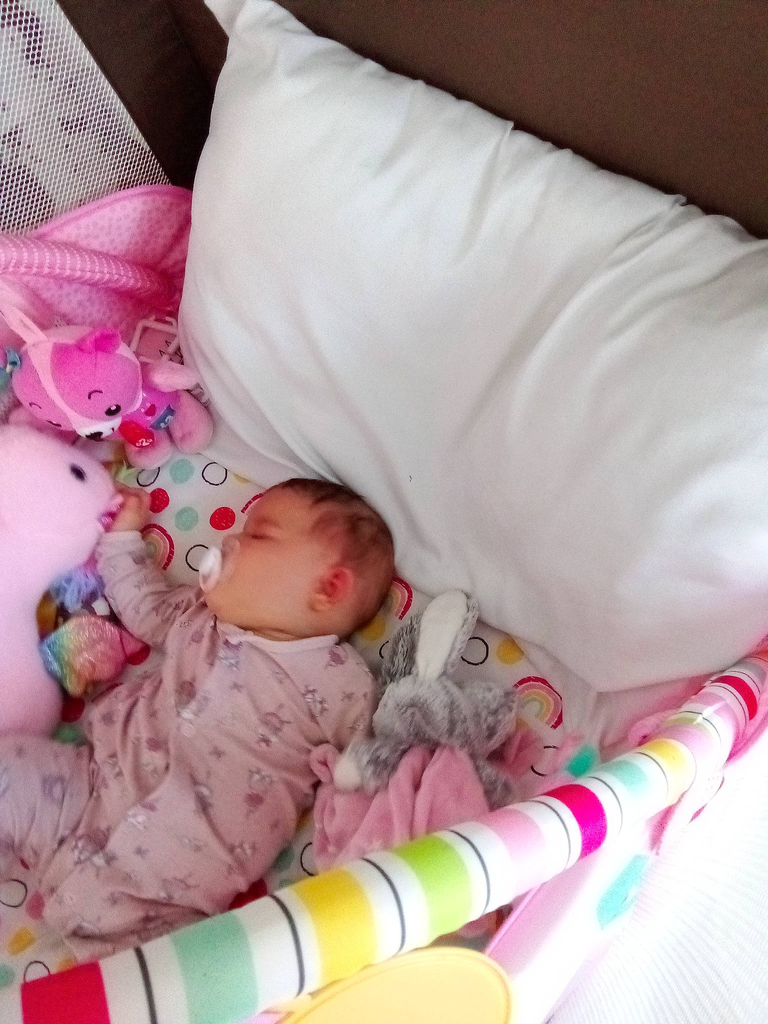 Ericka participe au concours pour gagner de l'argent avec cette photo : baby, baby_products, baby_sleeping, baby_toddler_clothing, bedding, bedtime, child, comfort, duvet, linens, nap, pattern, person, pink, room, sleep, sleeve, textile, toddler, white