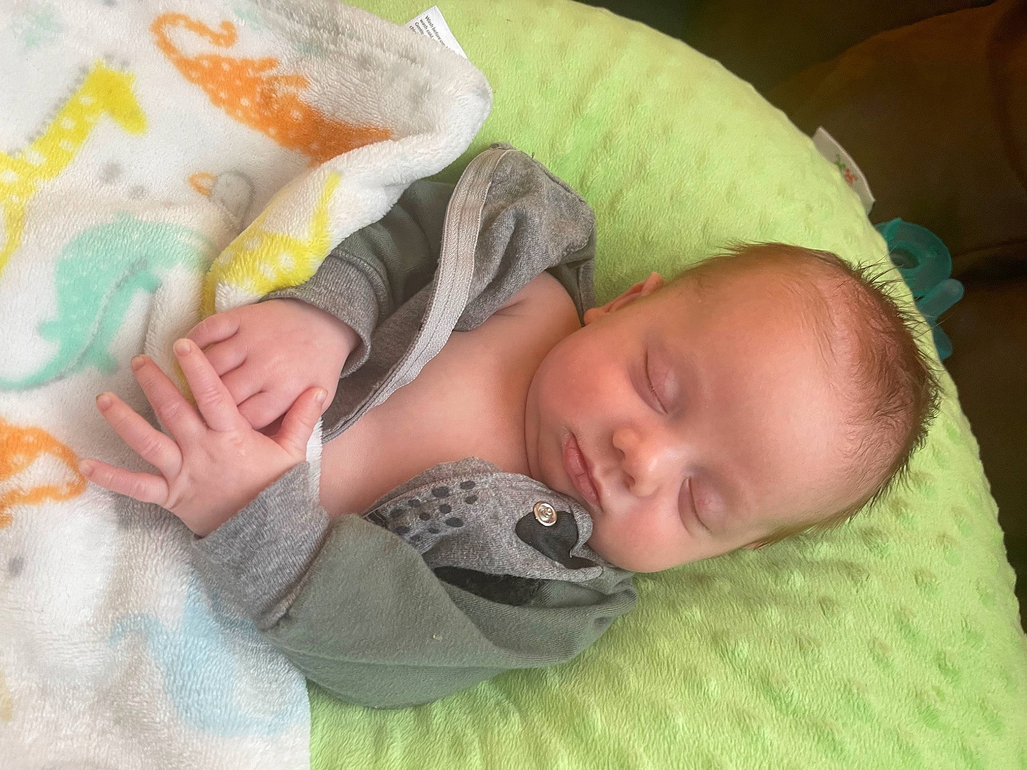 Ryder joined the competition — help win amazing prizes! baby, baby_products, baby_sleeping, baby_toddler_clothing, bedtime, cheek, child, comfort, eye, grass, hand, head, linens, nap, person, product, room, skin, sleep, textile