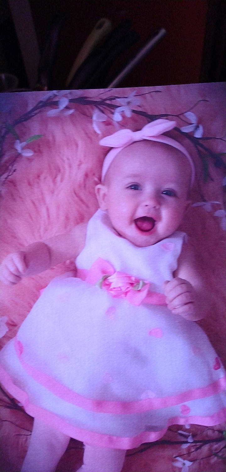 Kaliah is registered to the contest to win money with this photo: baby, baby_laughing, baby_toddler_clothing, beauty, cheek, child, event, face, facial_expression, fun, happy, headwear, magenta, pattern, person, petal, pink, purple, skin, smile