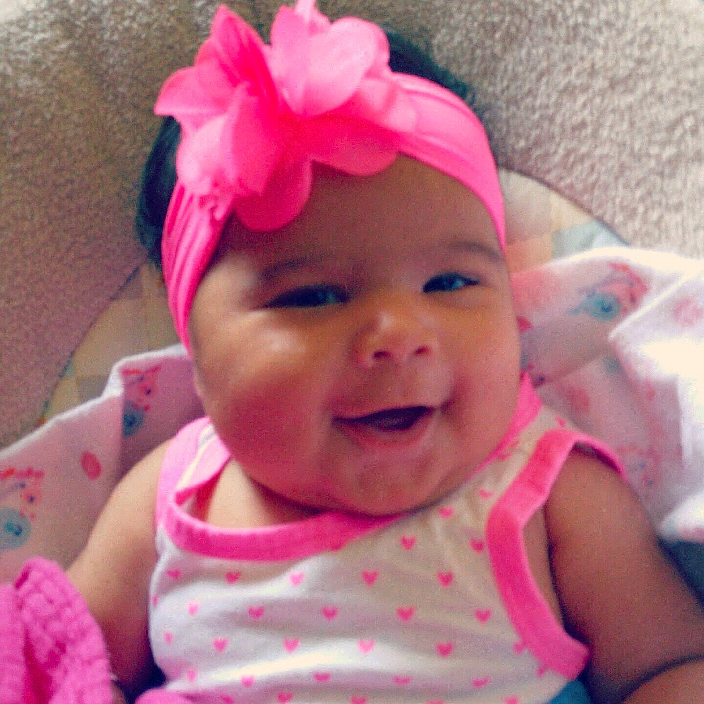 Lillyanna is registered to the contest to win money with this photo: child, eye, face, facial_expression, infant, nose, organ, person, pink, skin, smile, toddler