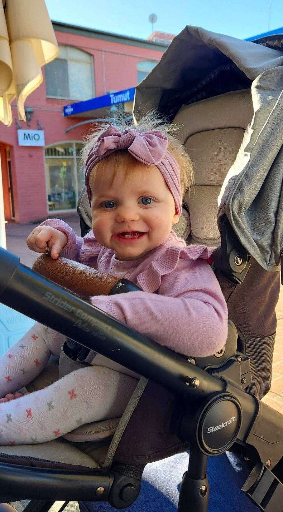 Hallee joined the competition — help win amazing prizes! baby, baby_carriage, baby_products, cheek, child, facial_expression, fun, hairstyle, hand, happy, headwear, iris, joy, leisure, people, person, pink, product, skin, smile