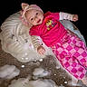 Krimson joined the competition — help win amazing prizes! baby, bright_colors, child, cloud_pillow, cozy, cute, cute_accessories, happy, headband, indoor, infant, lying_down, patterned_pants, pink_clothing, playful, portrait, relaxed, smiling, soft_toys, toddler