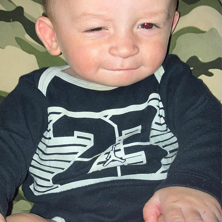 Tuff joined the competition — help win amazing prizes! baby, bodypart, clothing, couch, cushion, face, finger, furniture, hand, happy, head, homedecor, laughing, newborn, person, photography, portrait, sitting, smile, t_shirt