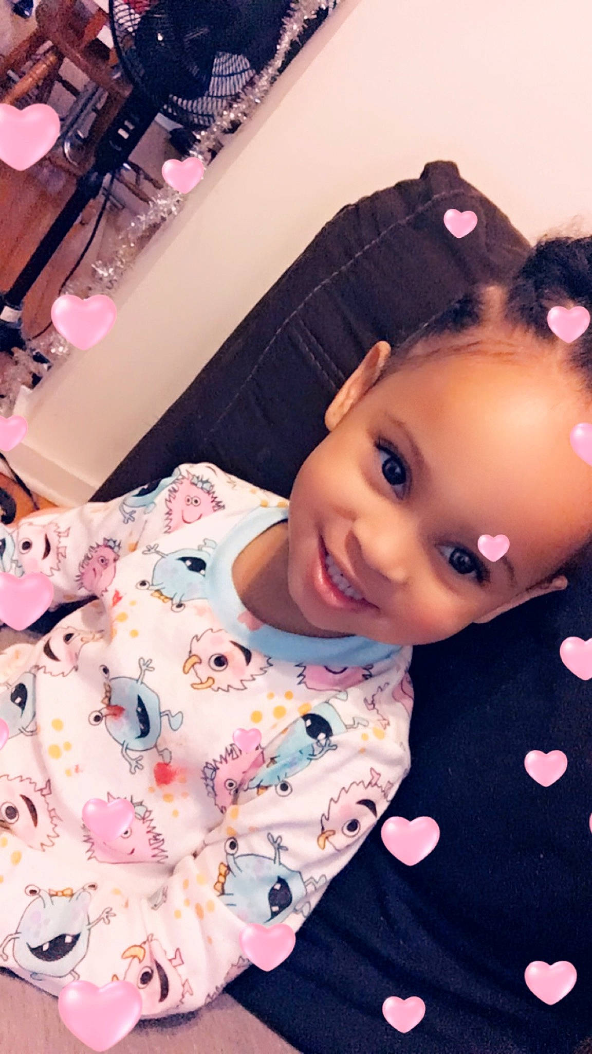 Alani is registered to the contest to win money with this photo: baby, black_hair, cheek, child, joy, lip, person, pink, selfie, toddler