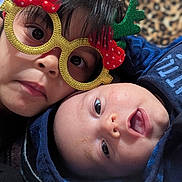 Jesus joined the competition — help win amazing prizes! baby, child, closeup, clothing, cute, expression, eyes, face, festive, glasses, happy, hat, head, holiday, indoors, portrait, sibling, skin, smile, warm