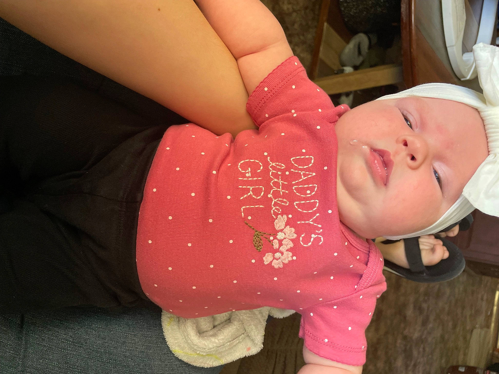 Lily is registered to the contest to win money with this photo: abdomen, arm, chest, child, cool, eyelash, finger, fun, gesture, hand, human_body, joint, lip, mouth, person, pink, skin, sleeve, textile, thigh