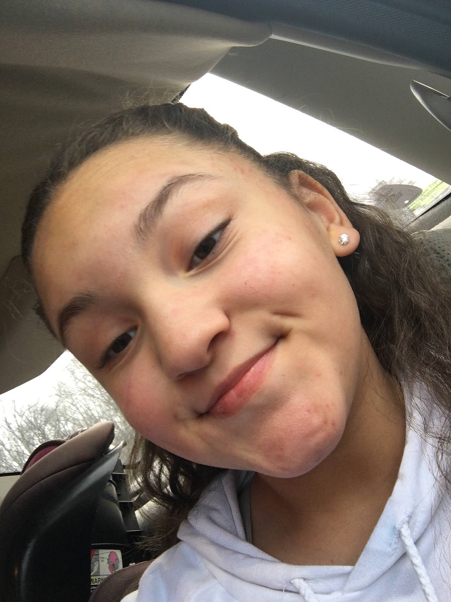 Hailie is registered to the contest to win money with this photo: black_hair, cheek, chin, ear, eyebrow, face, forehead, gesture, hair, head, jaw, joy, lip, mouth, neck, nose, person, photography, selfie, smile