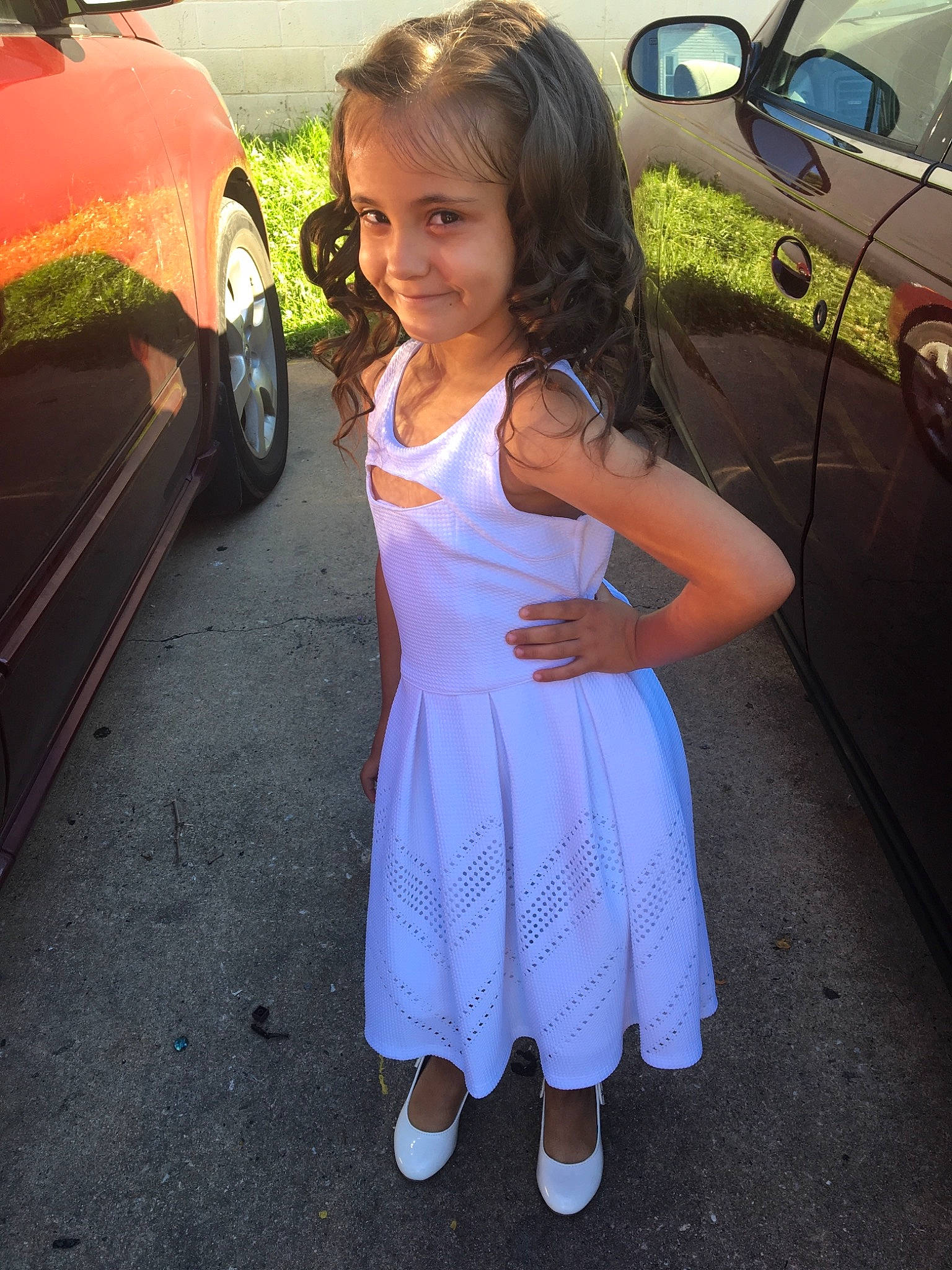 Leilani is registered to the contest to win money with this photo: car, child, family_car, long_hair, luxury_vehicle, person, smile, vehicle, vehicle_door