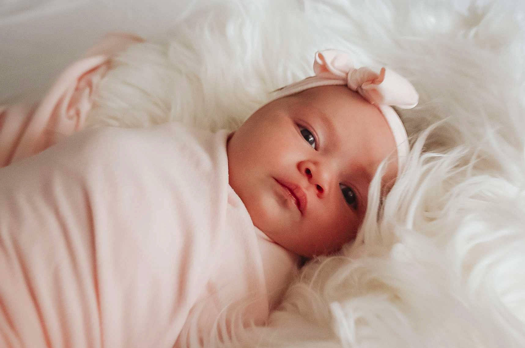 Olivia joined the competition — help win amazing prizes! baby, baby_toddler_clothing, child, comfort, eyelash, fashion_accessory, flash_photography, fur, happy, iris, linens, lip, no_expression, pattern, person, photo_shoot, portrait, portrait_photography, skin, sleeve