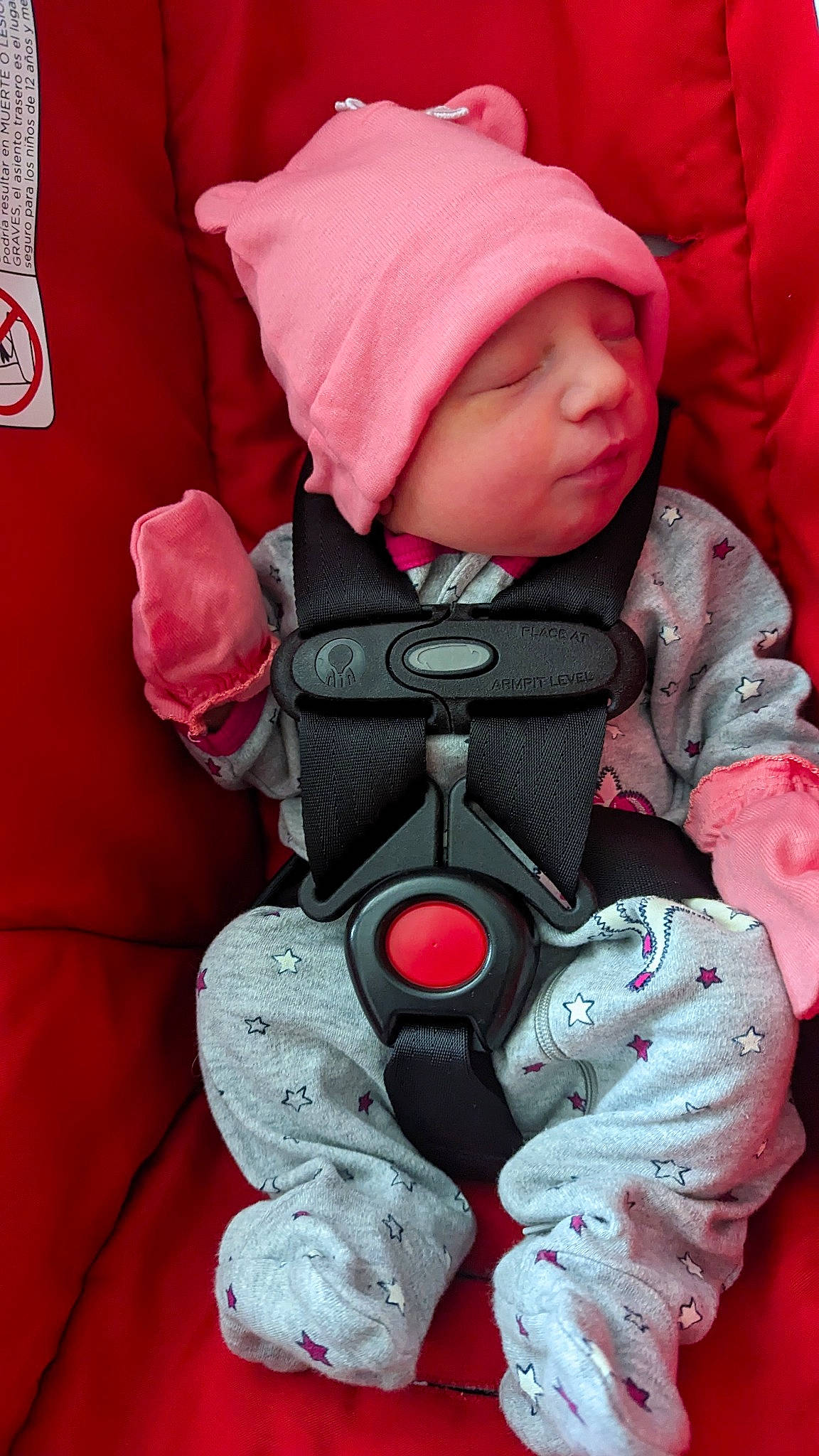 Aphrodite joined the competition — help win amazing prizes! baby, baby_carriage, baby_products, baby_safety, baby_sleeping, baby_toddler_clothing, car_seat, carmine, cheek, child, comfort, headwear, magenta, person, pink, product, red, sitting, sleeve, textile