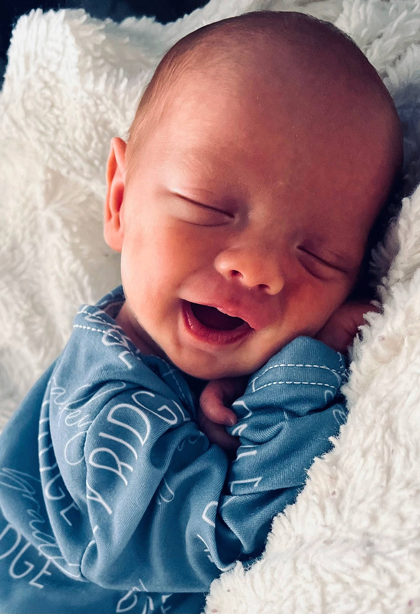 Bradley is registered to the contest to win money with this photo: azure, baby, baby_toddler_clothing, cheek, child, comfort, eye, facial_expression, flash_photography, happy, iris, lip, nose, person, product, skin, sleeve, smile, textile, toddler