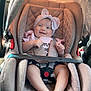 baby, bow, car_interior, car_seat, child, child_safety, clothing, cute, feet, happy, headband, infant, legs, portrait, safety, seat, seatbelt, smiling, soft_lighting, travel
