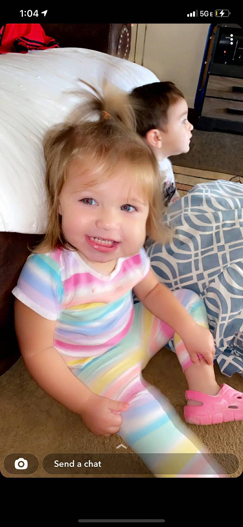 Mackenzie joined the competition — help win amazing prizes! baby_toddler_clothing, child, face, floor, fun, hairstyle, happy, head, human_leg, iris, joy, leisure, person, pink, sitting, skin, smile, summer, t_shirt, thigh