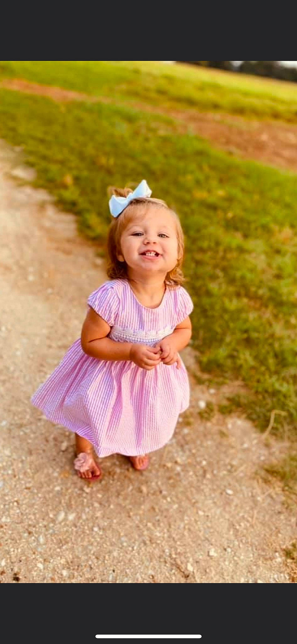 Mackenzie joined the competition — help win amazing prizes! baby, baby_toddler_clothing, eye, face, facial_expression, grass, hair, happy, head, joy, leaf, mammal, people_in_nature, person, pink, plant, skin, smile, summer, sunlight