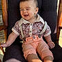 toddler, child, smiling, shirt, suspenders, pants, barefoot, chair, cushion, wood, indoor, happy, portrait, baby, cute, clothing, person, face, sitting, sunlight