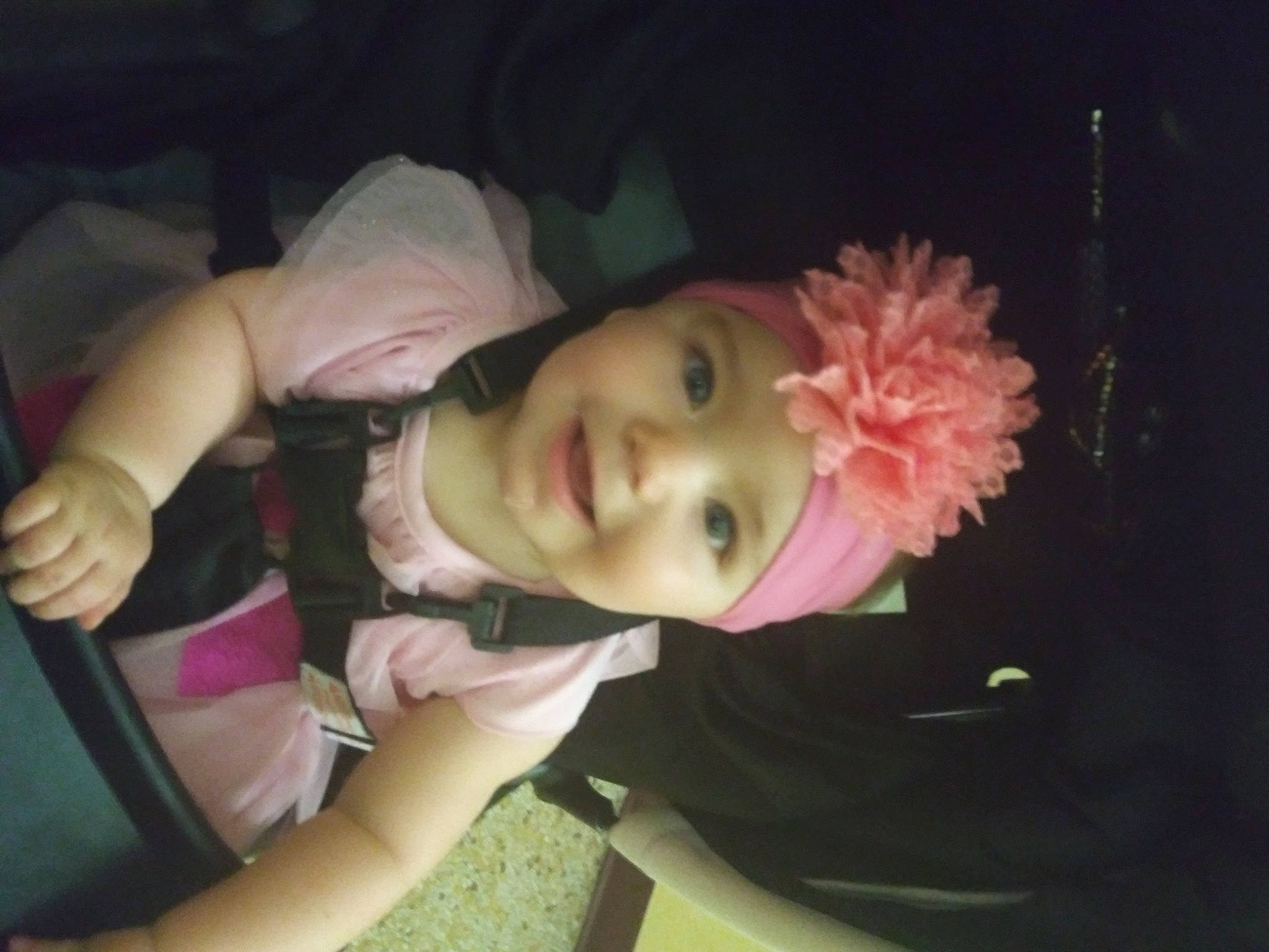 Evalina is registered to the contest to win money with this photo: cheek, child, cool, ear, finger, flower, fun, hand, headwear, jaw, joy, mouth, nose, person, photography, pink, plant, thumb